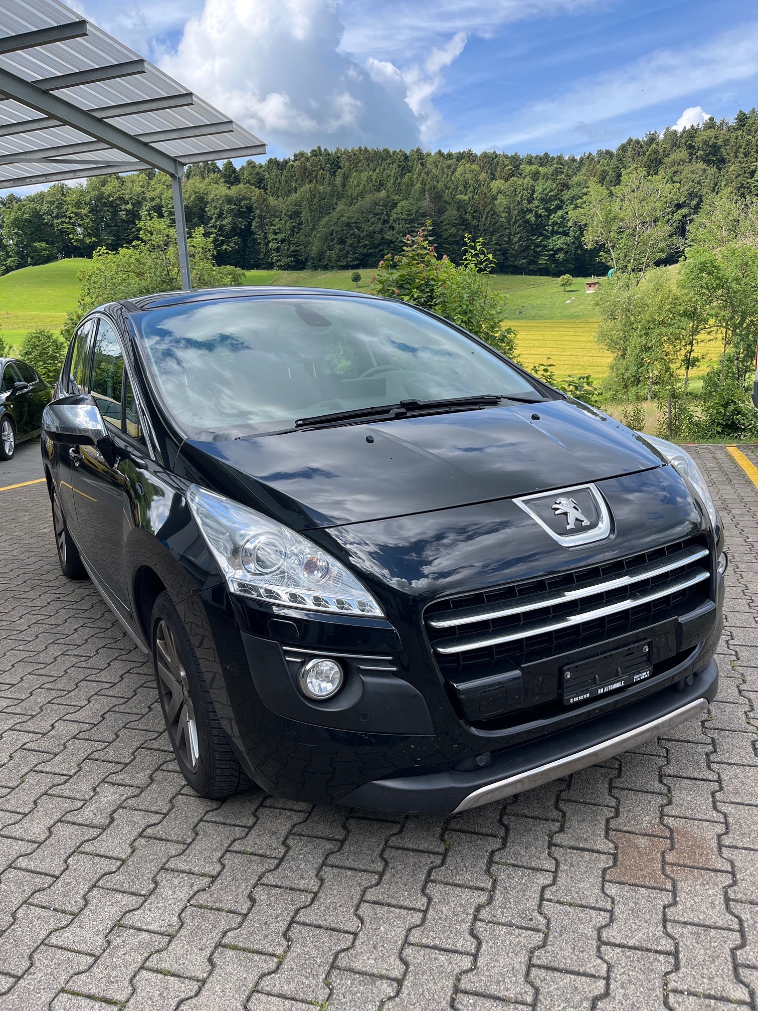 PEUGEOT 3008 HYbrid4 — zdjęcie 1