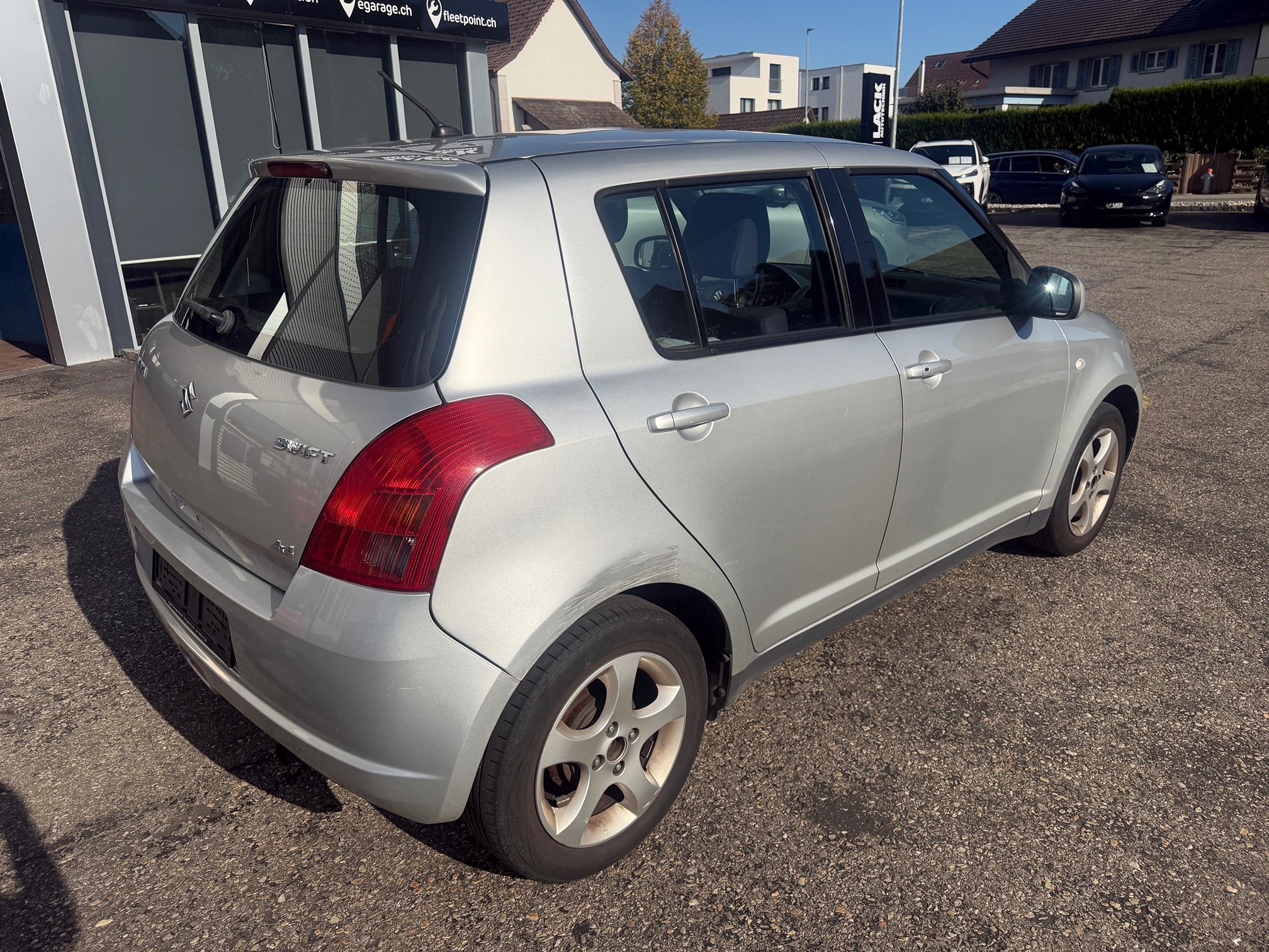 SUZUKI Swift 1.3 4WD — zdjęcie 7