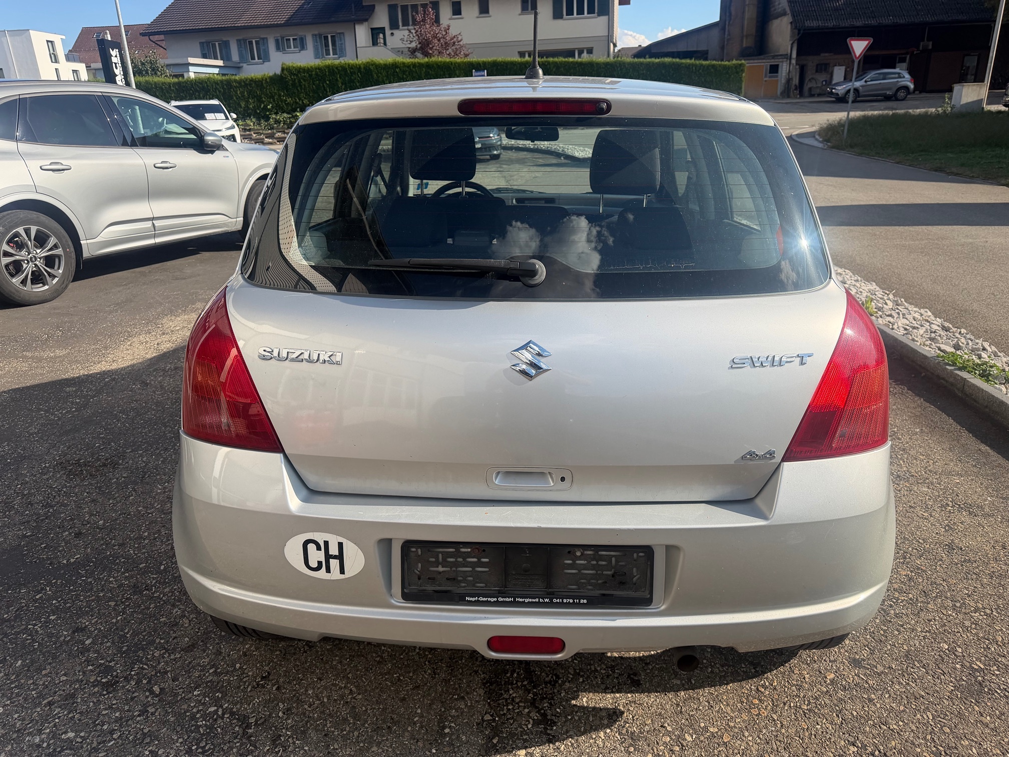 SUZUKI Swift 1.3 4WD — zdjęcie 4